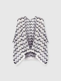 Cape en maille avec motif chevron