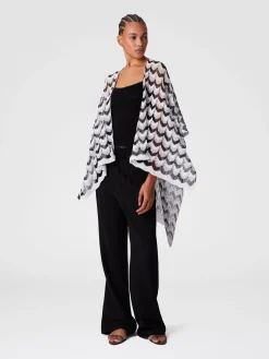 Cape en maille avec motif chevron