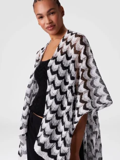 Cape en maille avec motif chevron