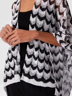Cape en maille avec motif chevron