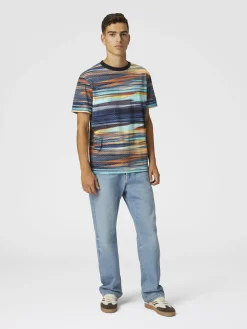 Cinq poches en jean avec broderie en zigzag