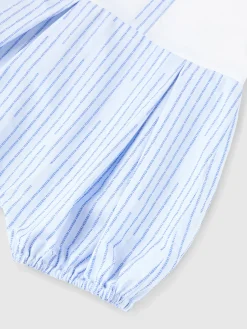 Combinaison avec logo Missoni.