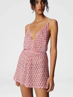 Combinaison courte en dentelle avec dos nu