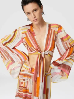 Crop top en soie imprimée à manches larges et nœud sur le devant