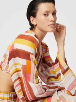 Crop top en soie imprimée à manches larges et nœud sur le devant