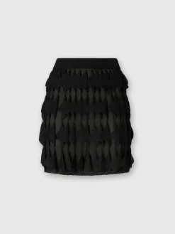Jupe courte à volants géométriques
