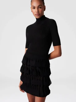 Jupe courte à volants géométriques