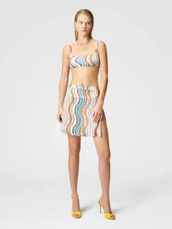 Minijupe couvrante à motif vague lamé et fente