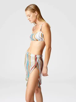 Minijupe couvrante à motif vague lamé et fente