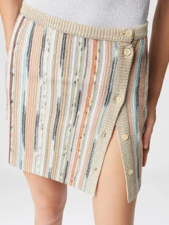 Minijupe rayée en viscose flammée lamée avec boutonnage sur le côté