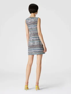 Mini-robe en maille lamée avec décolleté en cœur