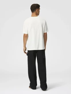 Pantalon cargo en denim avec empiècements en tricot à chevrons