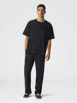 Pantalon de jogging en coton avec broderie en zigzag