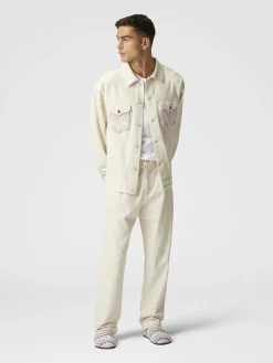 Pantalon en denim classique avec empiècements en tricot à chevrons