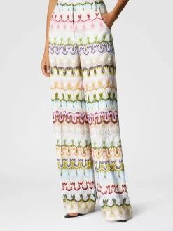 Pantalon long taille haute avec motif floral abstrait