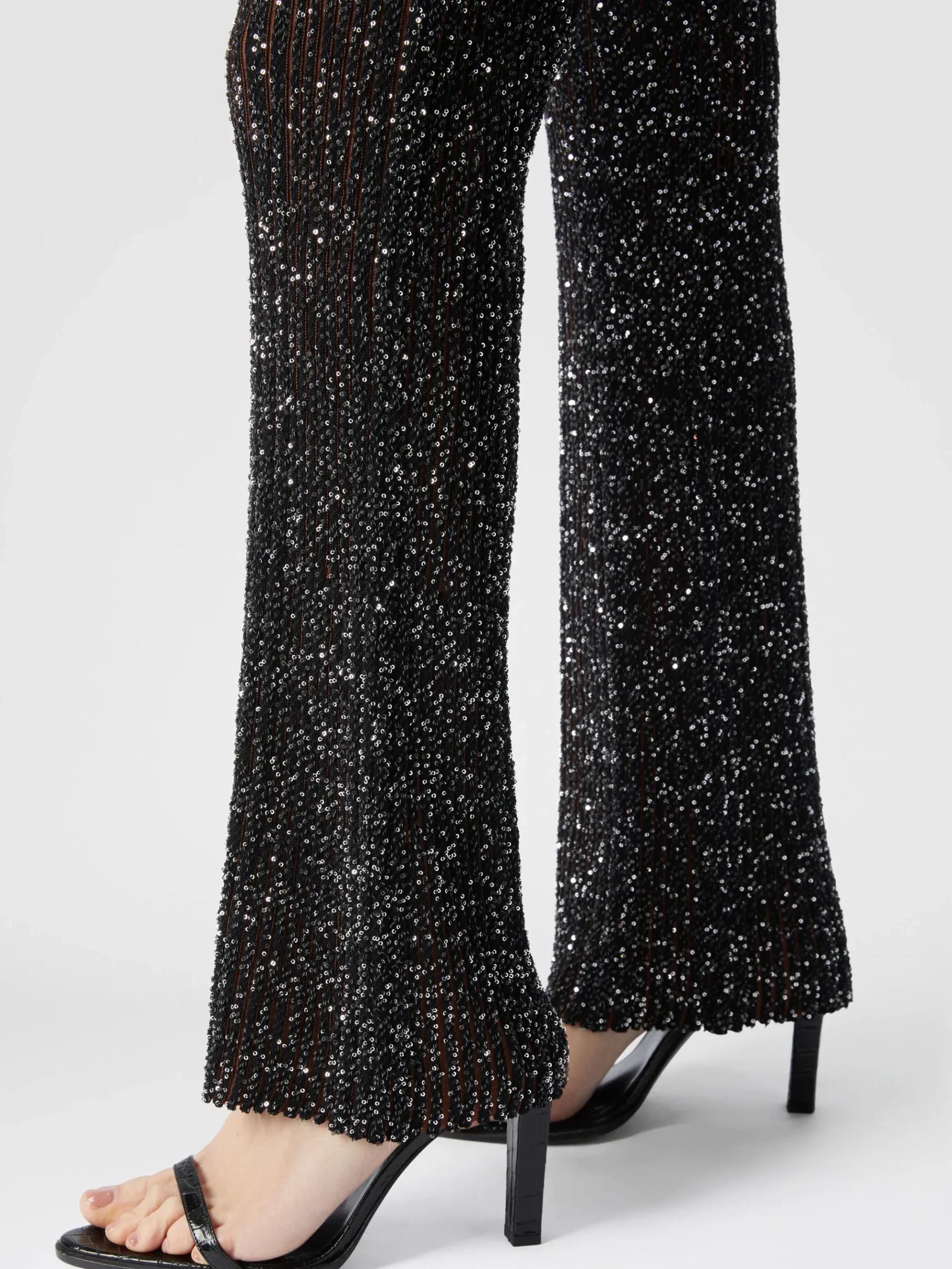 Pantalon évasé stretch côtelé à sequins