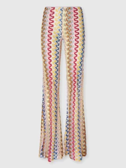 Pantalon évasé taille basse en dentelle de viscose lamée