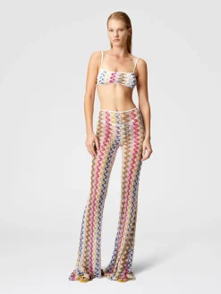 Pantalon évasé taille basse en dentelle de viscose lamée