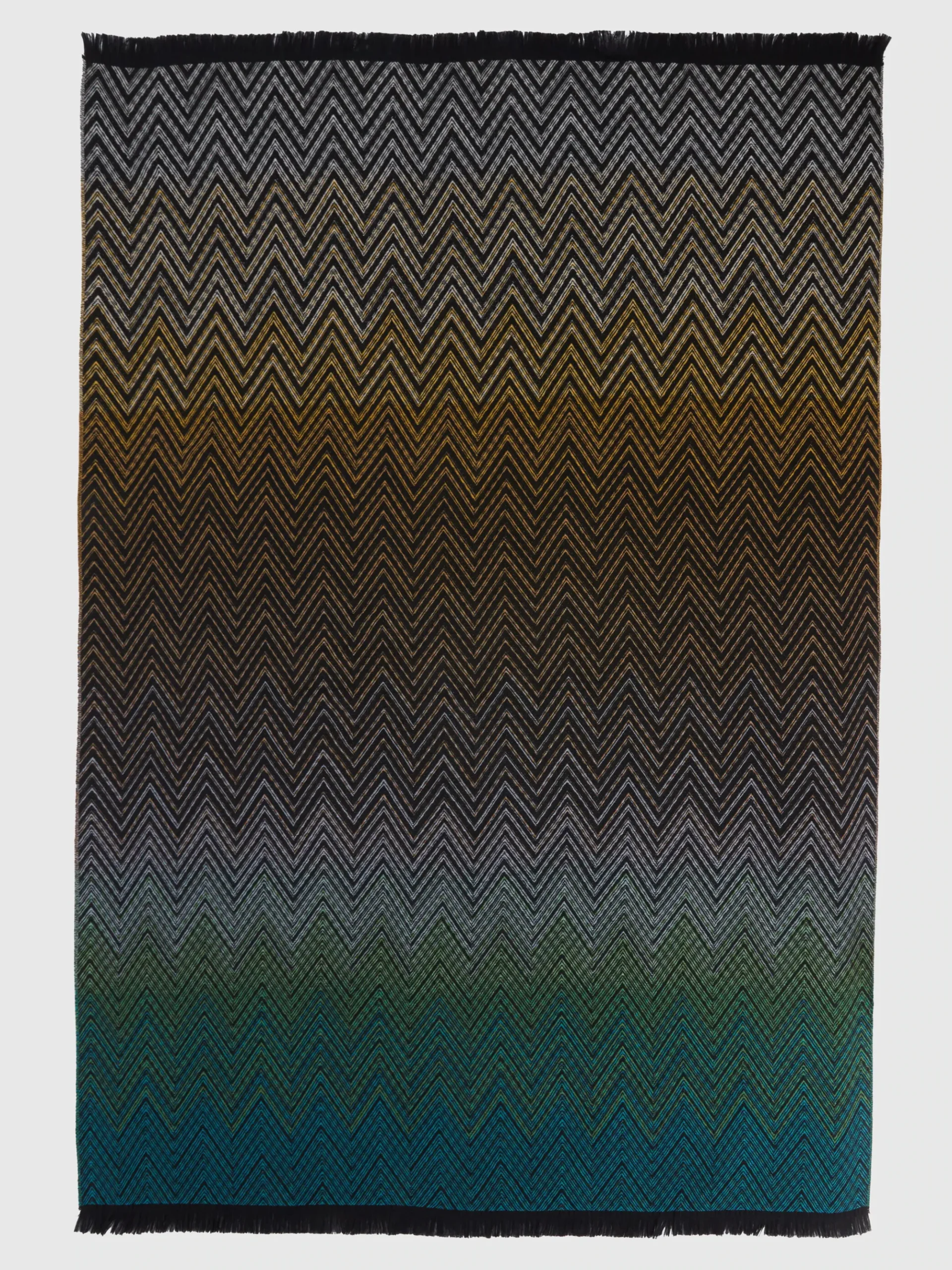 Plaid 135x195 cm en laine mélangée à chevrons avec franges