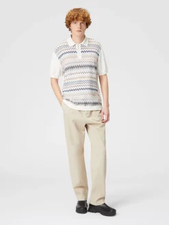 Polo en maille de coton zigzag avec empiècements de couleur unie