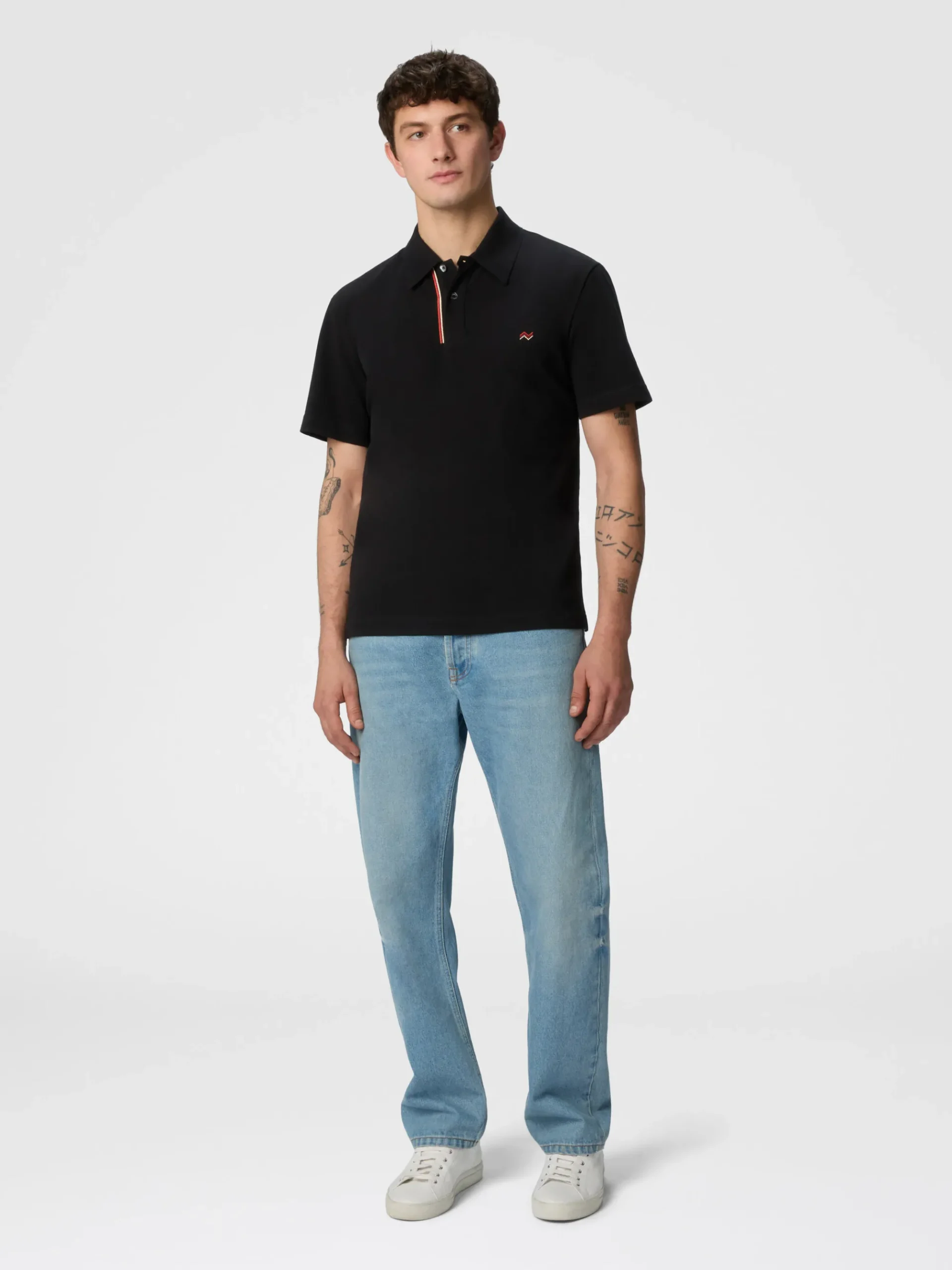 Polo en piqué de coton de couleur unie avec broderie en zigzag et détail contrasté