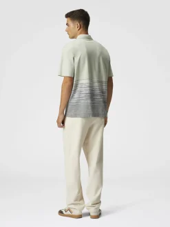 Polo flammé en coton et lin avec broderie en zigzag