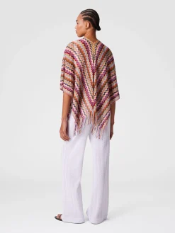 Poncho en maille avec motif chevron et franges