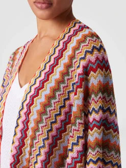 Poncho en maille avec motif chevron et franges