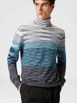 Pull col roulé en laine flammée