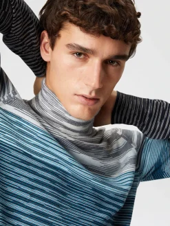 Pull col roulé en laine flammée