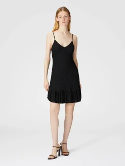 Robe courte sans manches avec jupe à volants en dentelle