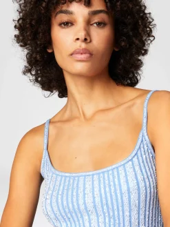 Robe midi côtelée sans manches avec paillettes et fente