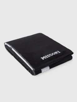 Serviette de plage Skunk 180x100cm en tissu de coton éponge flammé