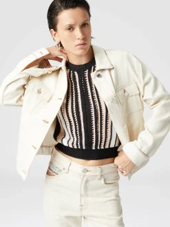 Veste en jean avec empiècements grecs en zigzag