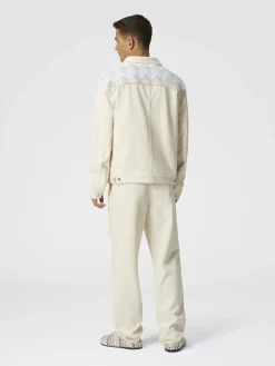 Veste en jean avec empiècements en tricot à chevrons